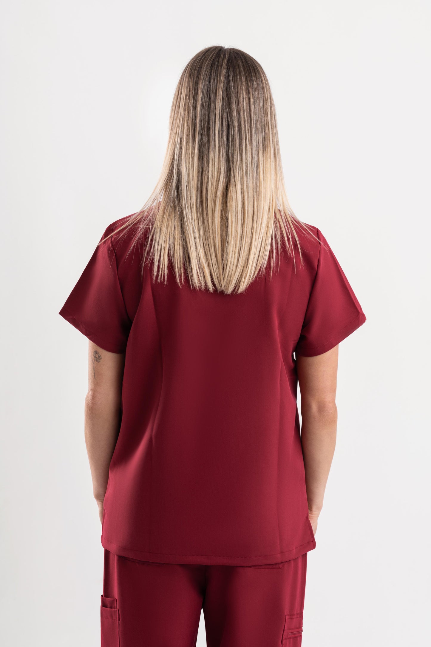 women’s maroon healthcare scrub top for professionals