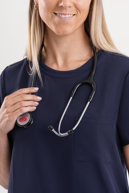 stylish navy blue scrub top for professional women