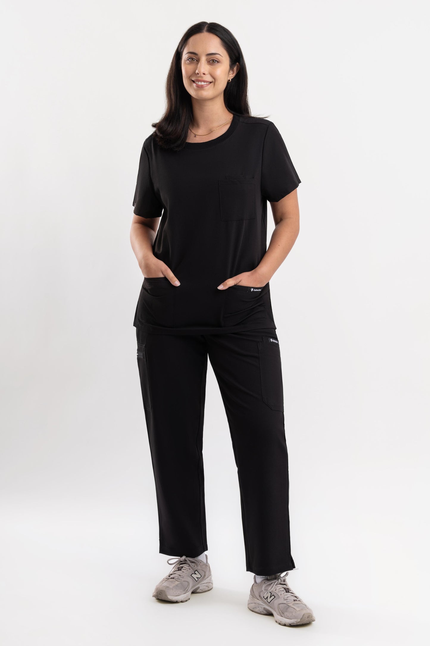 women’s black scrub top for healthcare professionals